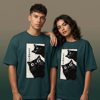 BLUE  oversized t-shirt featuring Japanese-inspired black cat graphic artwork with curious wide-eyed cats and manga aesthetic design.