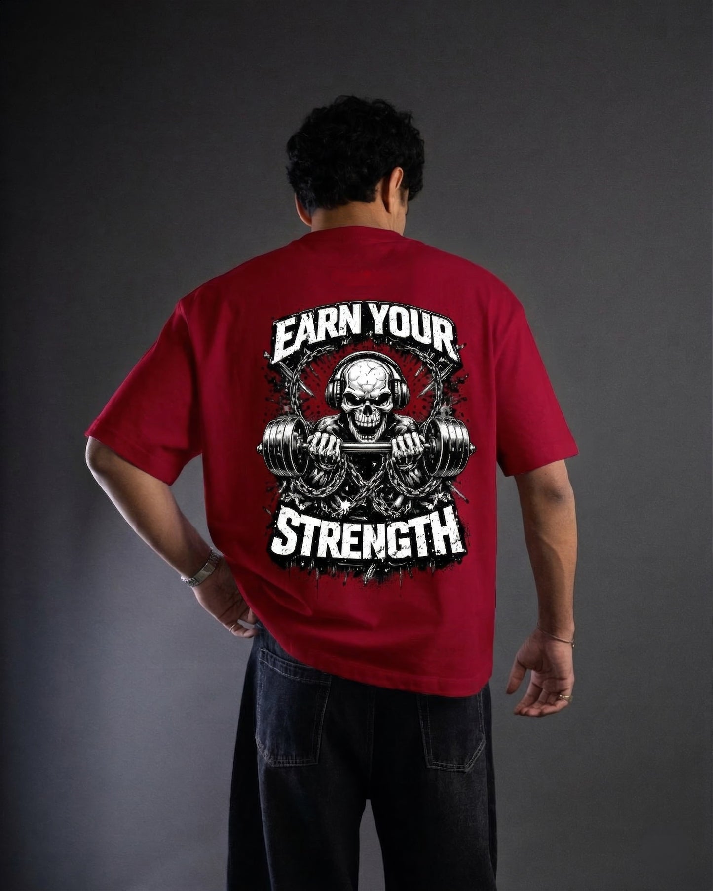 Earn Your Strength red oversized gym t-shirt back print skull barbell design StayRaw