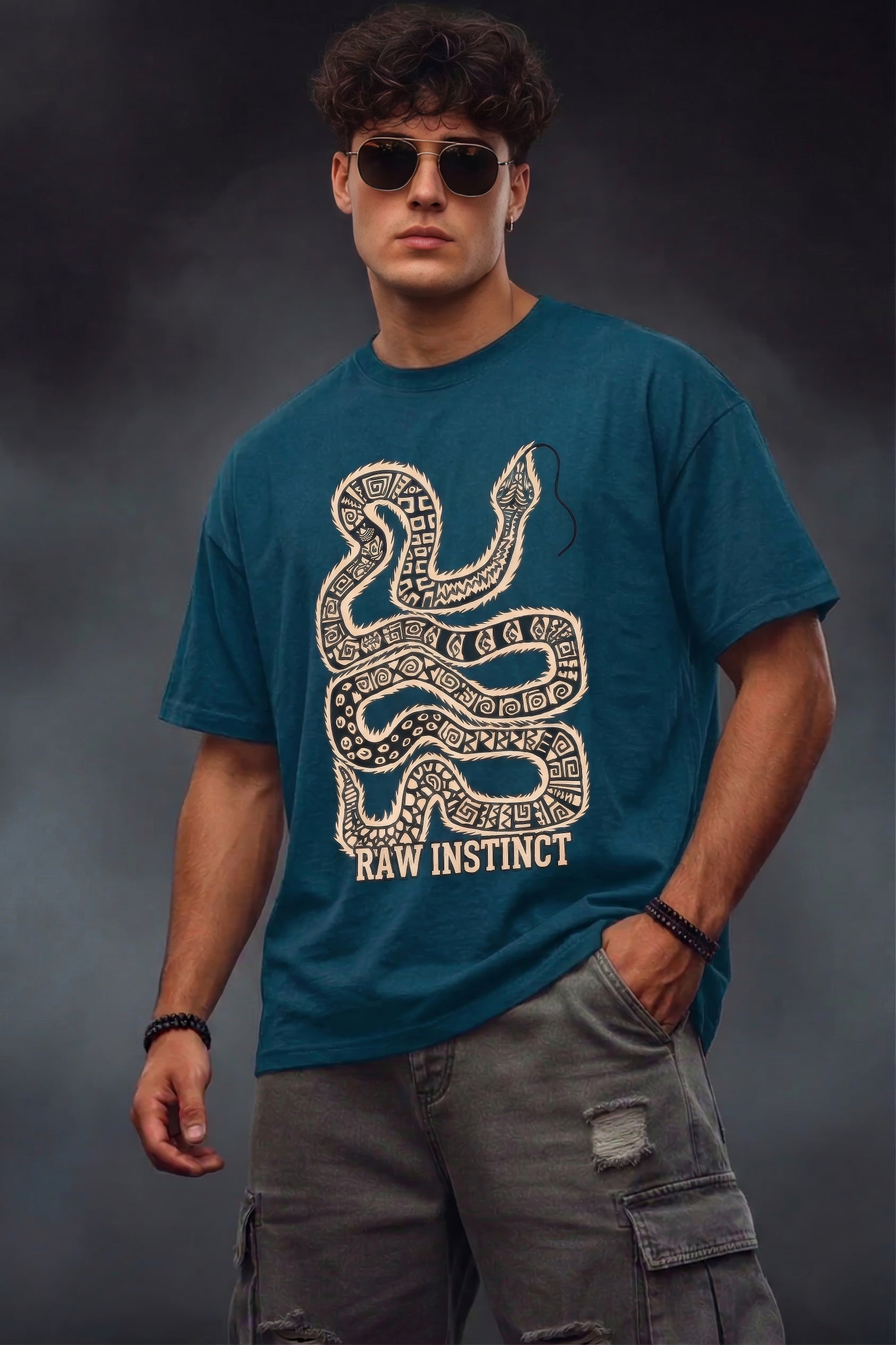 PETROL BLUE oversized t shirt with tribal snake graphic and raw instinct text