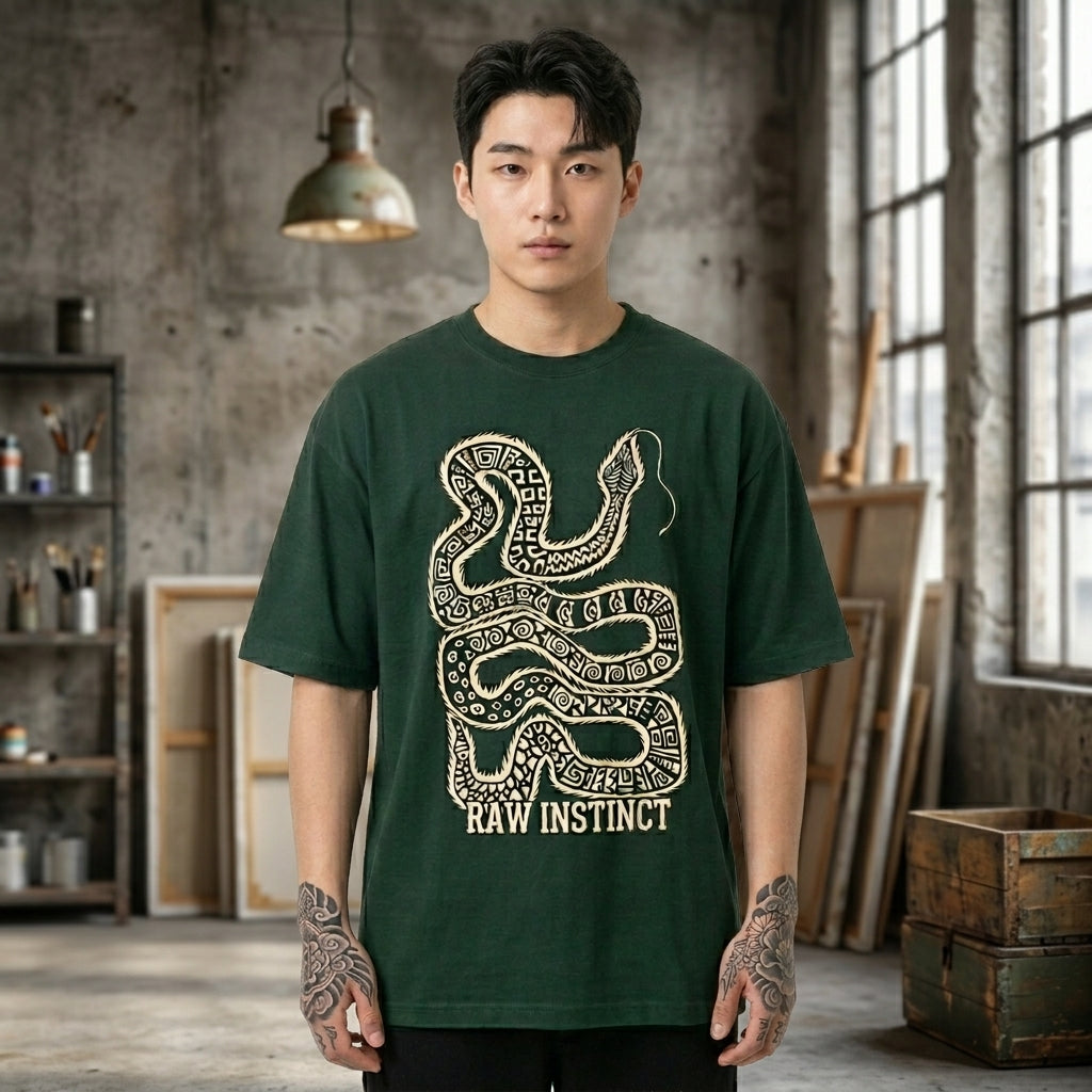 GREEN oversized t shirt with tribal snake graphic and raw instinct text