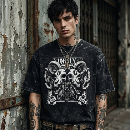 Black oversized acid wash t-shirt with unholy ram skull gothic graphic design on front